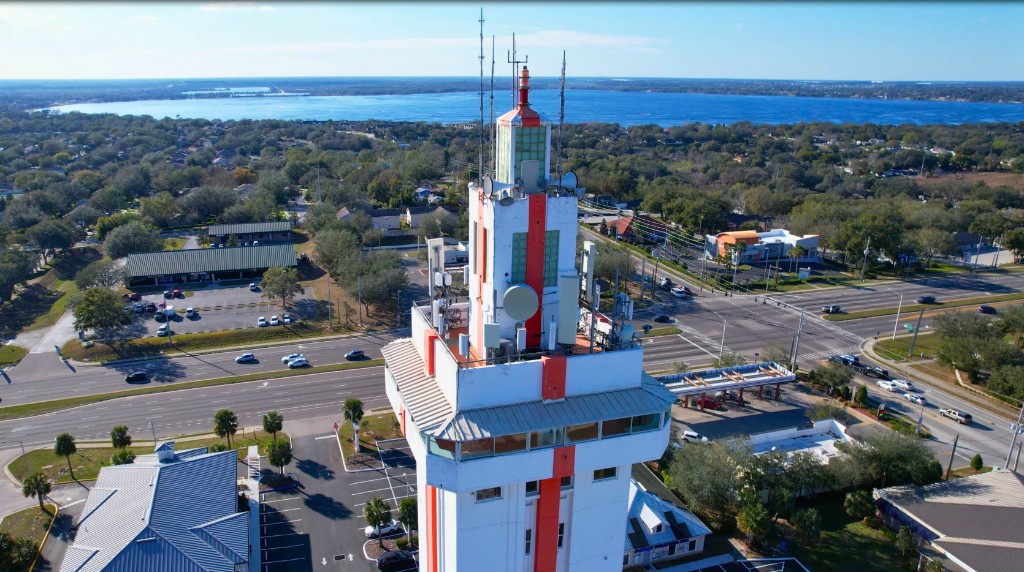 Aerial view of Citrus Tower in Clermont Florida surrounded by rolling hills and lakes